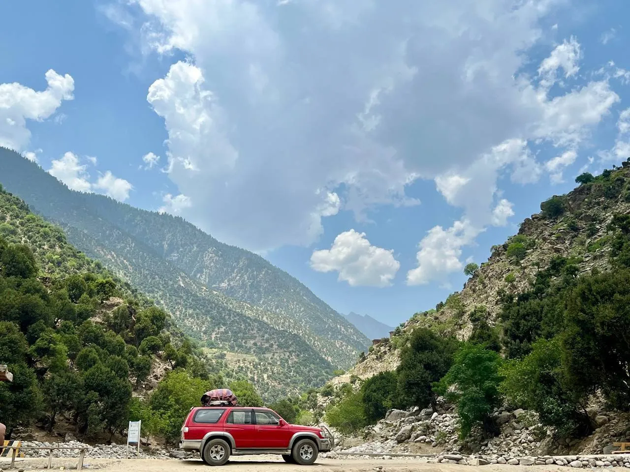 Natural scenery of Nuristan Province in eastern Afghanistan, showing forested mountains, rivers, and traditional villages in a remote landscape.
