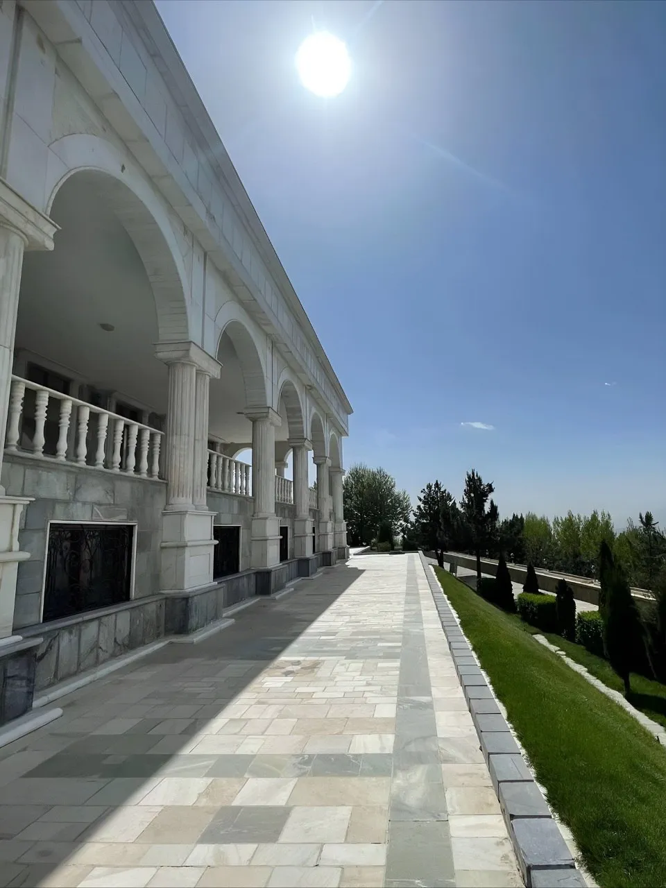 Jabal Saraj Palace in Parwan Province surrounded by mountains, rivers, and green landscapes, showing historical architecture and natural beauty of central Afghanistan.