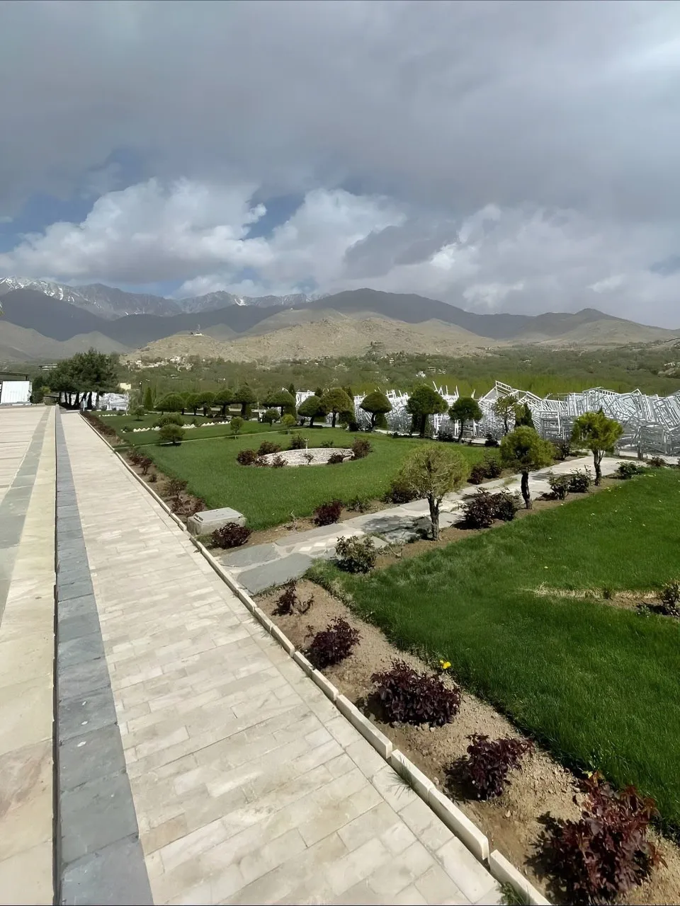 Jabal Saraj Palace in Parwan Province surrounded by mountains, rivers, and green landscapes, showing historical architecture and natural beauty of central Afghanistan.