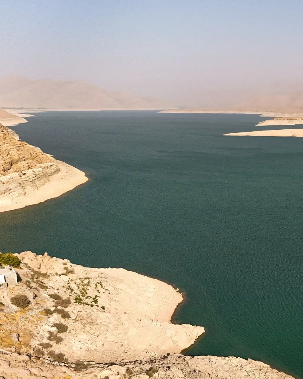 Kajaki Dam along the Helmand River in Helmand Province, showing water, surrounding mountains, and dramatic natural scenery in southern Afghanistan.