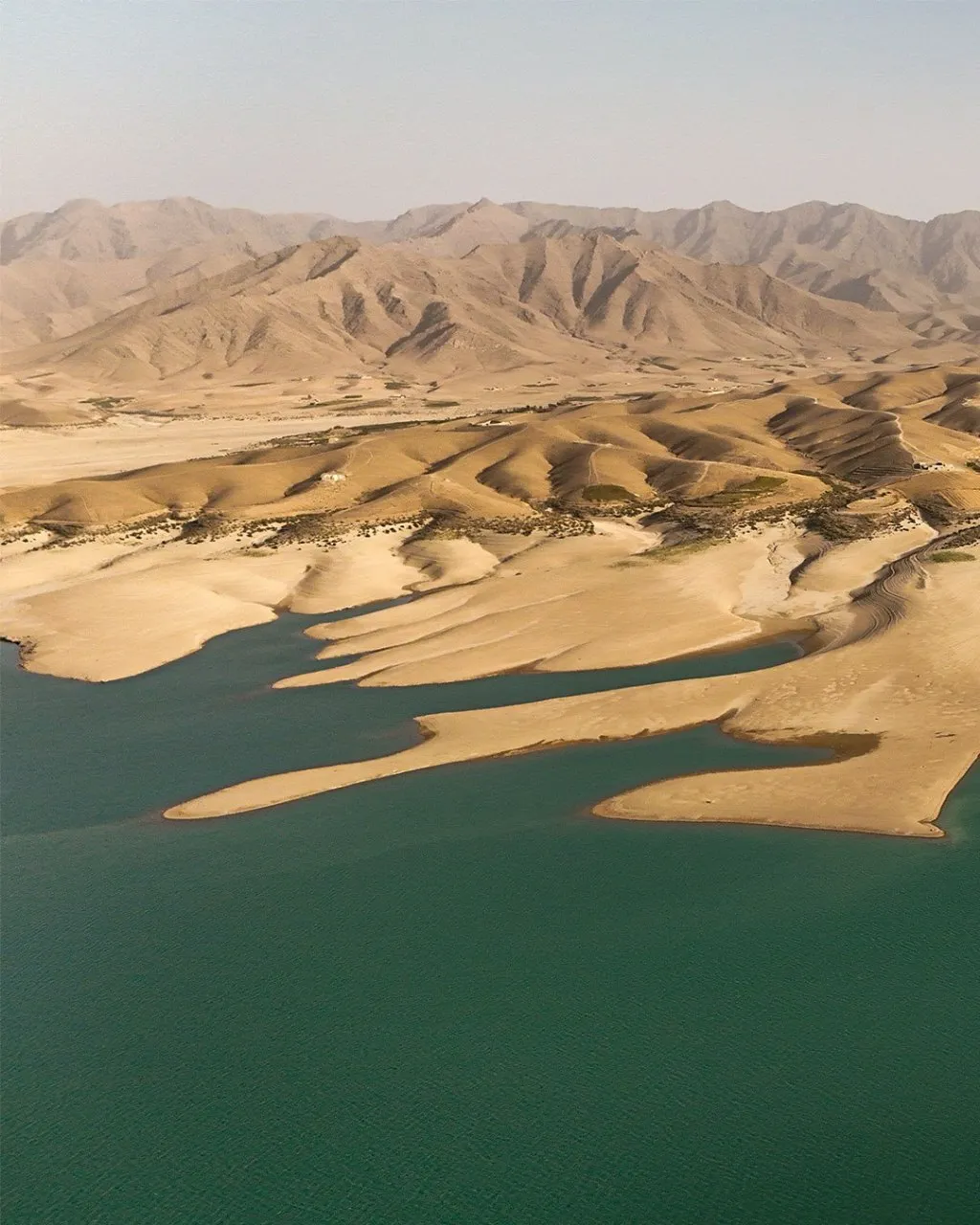Kajaki Dam along the Helmand River in Helmand Province, showing water, surrounding mountains, and dramatic natural scenery in southern Afghanistan.