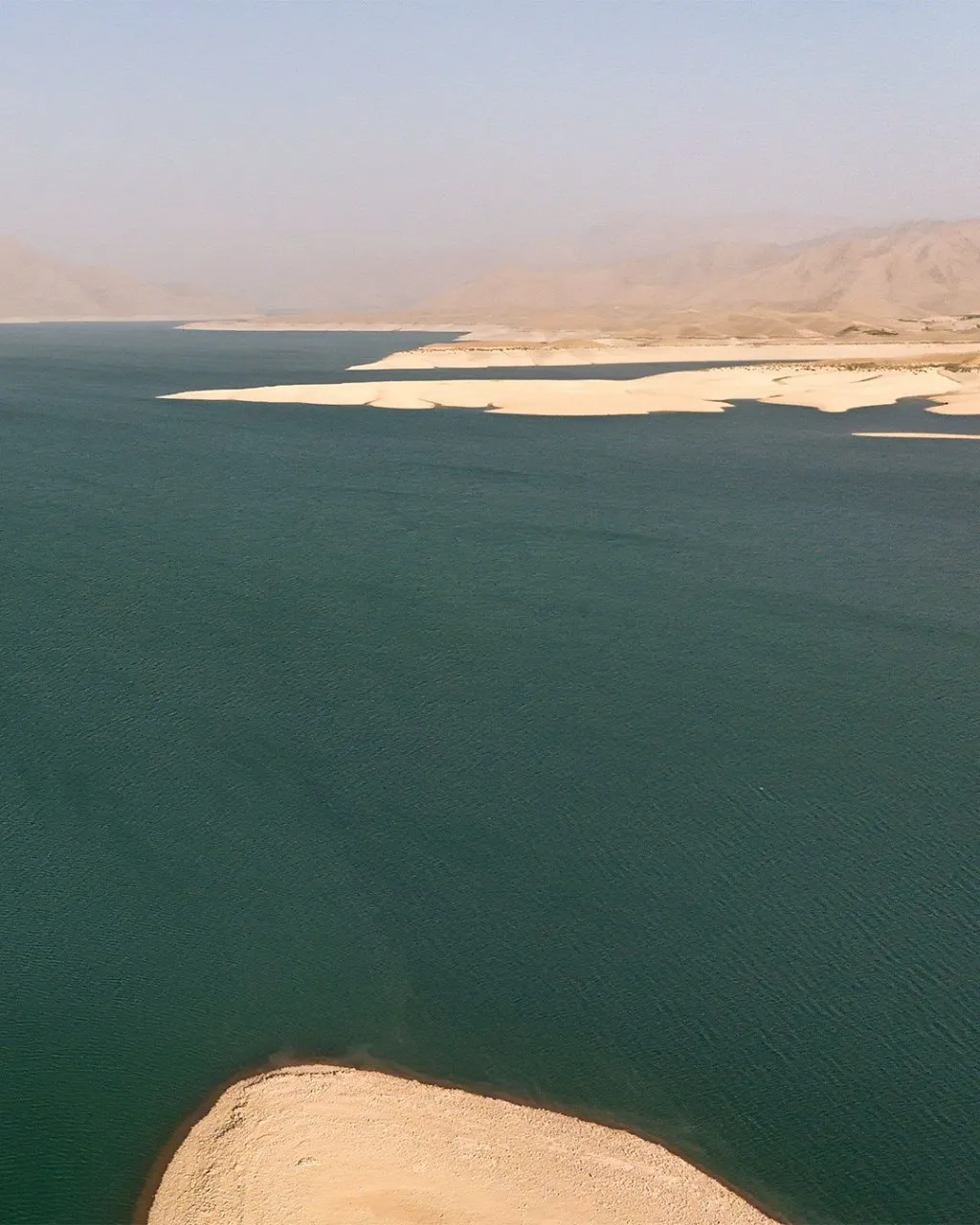 Kajaki Dam along the Helmand River in Helmand Province, showing water, surrounding mountains, and dramatic natural scenery in southern Afghanistan.