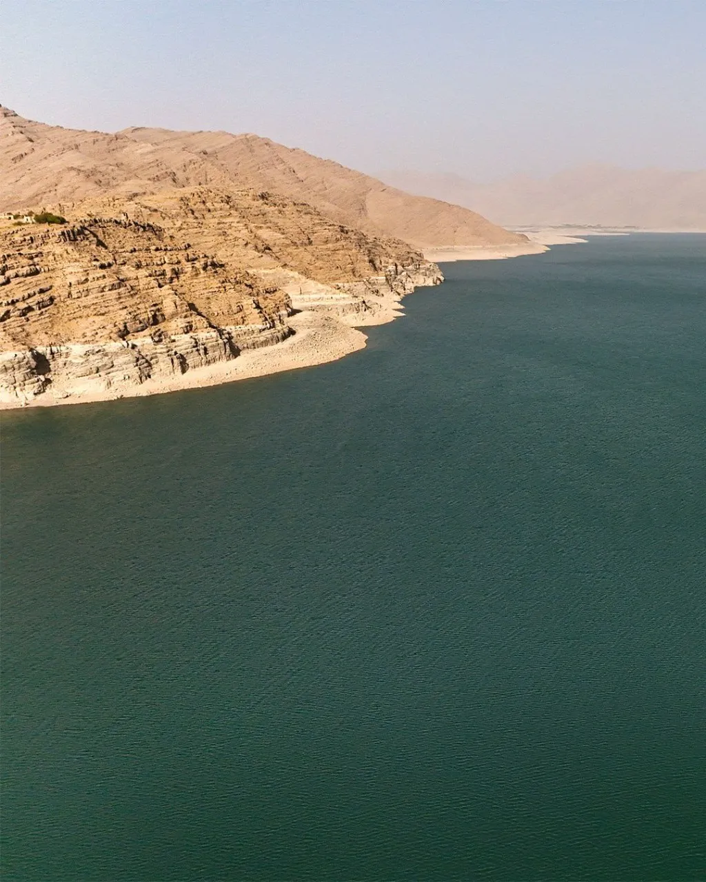 Kajaki Dam along the Helmand River in Helmand Province, showing water, surrounding mountains, and dramatic natural scenery in southern Afghanistan.